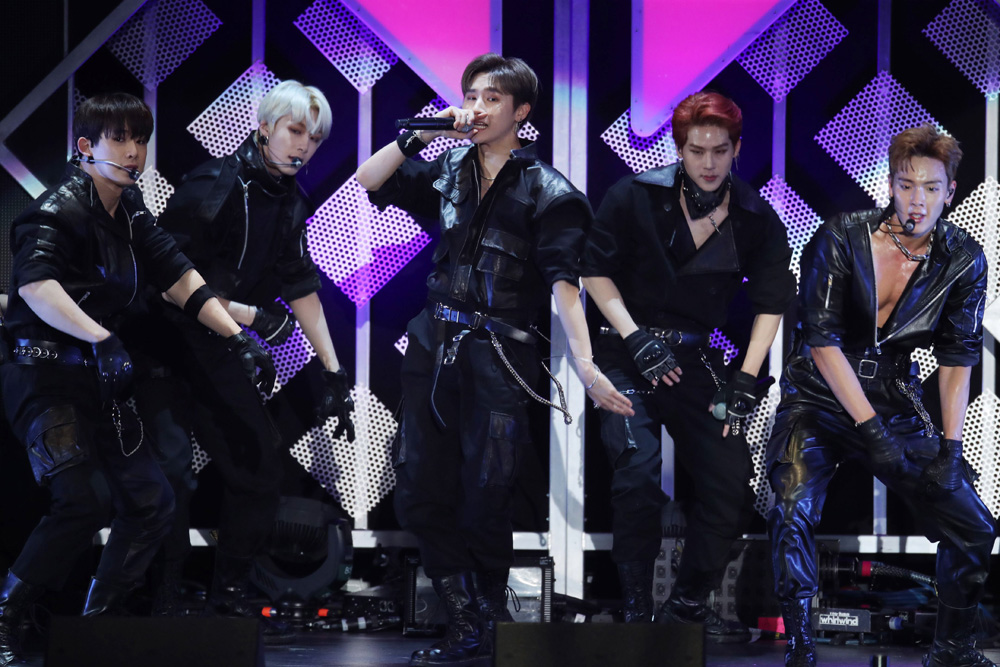 MONSTA X performing on tour